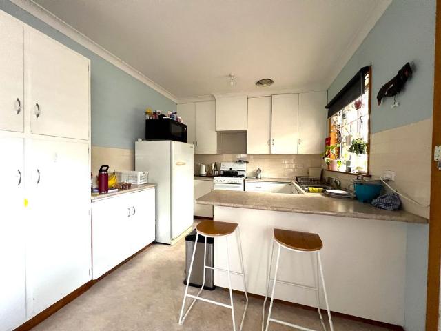 Polished Floors, Fresh Carpet & Room to Move