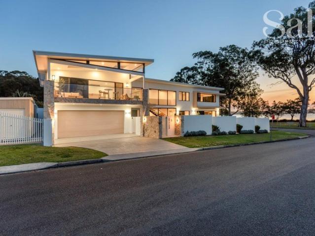 Polished Lakeside Entertainer in Enviable Setting