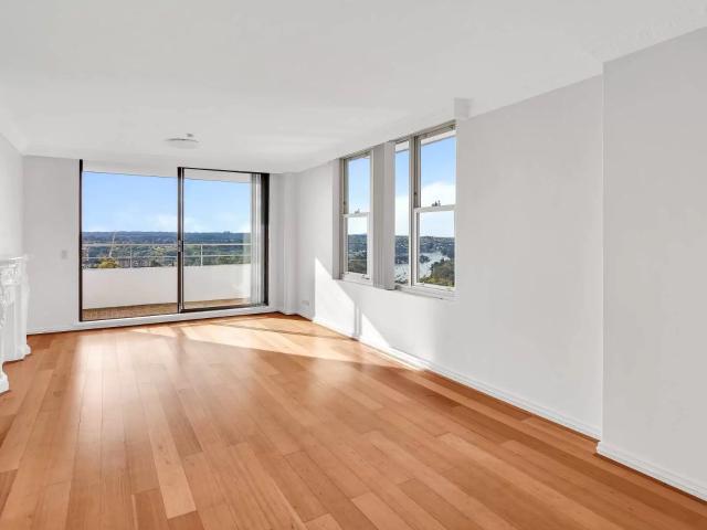 POPULAR HIGH RISE UNIT WITH CAPTIVATING WATER VIEWS