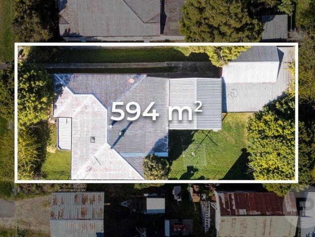 POST WAR HOME WITH ENDLESS POTENTIAL ON 594M2