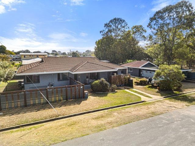 Position, Potential and Space Solid Brick Home on a Generous Corner Allotment