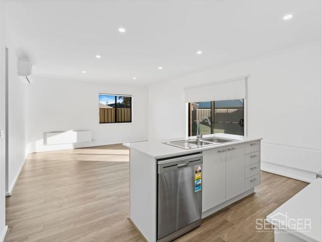 Positioned for Convenience, Designed for Family Living