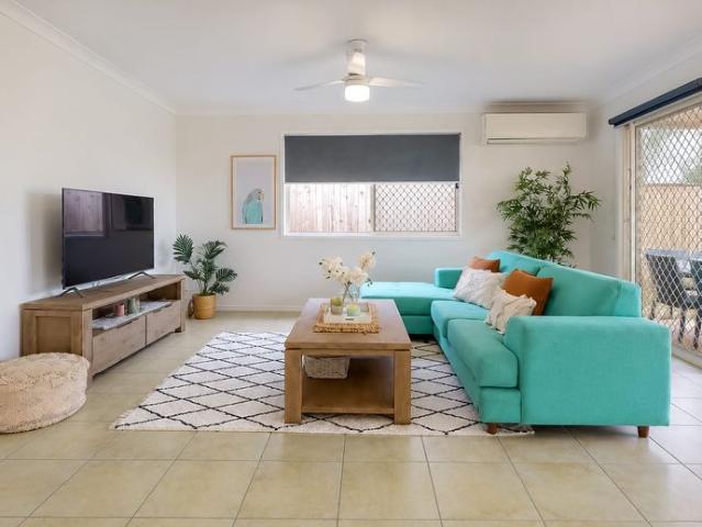 Positioned with a Park and Playground Across the Road!