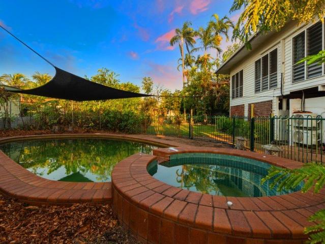 Potential packed, elevated home on large leafy block