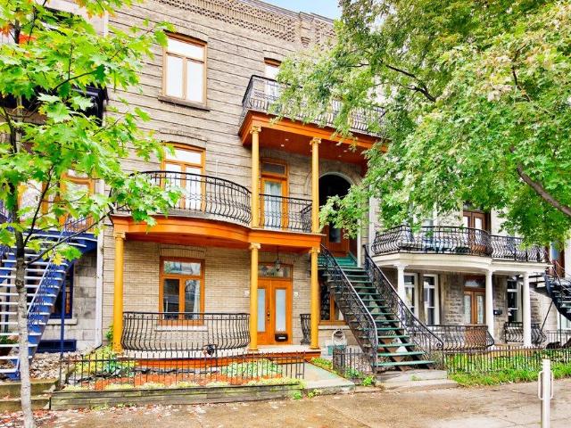 Plateau Mont Royal Montreal Furnished Townhouse Rental on Saint Hubert Gorgeous 2 Bedroom with 2 Bathrooms plus Private Rooftop Patio and Exposed Brick