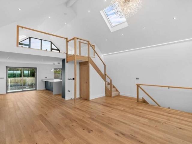 PLEASE EMAIL TO REGISTER YOUR INTEREST A stunning 4 bedroom energy efficient reverse level property built to a high specification. Garden, parking and garage