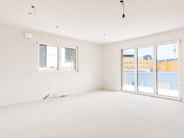PROVISIONSFREI! 3 Zimmer Erstbezug im Stadtzentrum mit 12 m² Balkon und Gebirgsblick