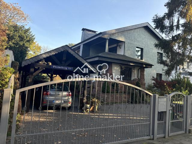 Provisionsfrei Freistehendes Einfamilienhaus mit Natursteingarten und Carport in Offenbach