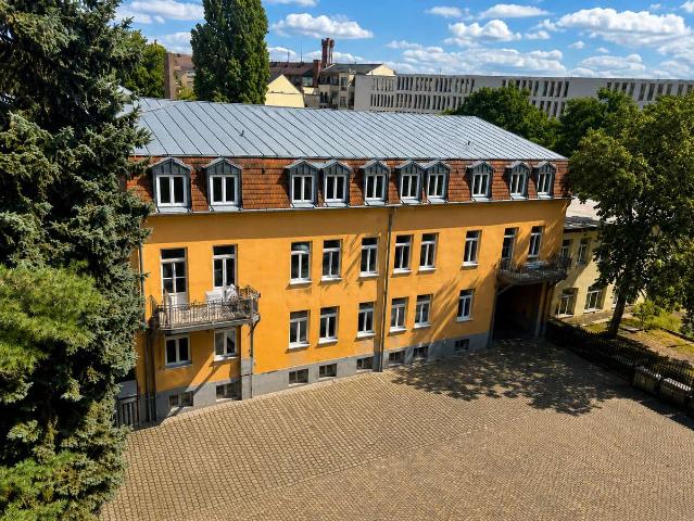 Provisionsfrei investieren: Vermietete Wohnung mit Tiefgaragenplatz in der Dresdner Neustadt