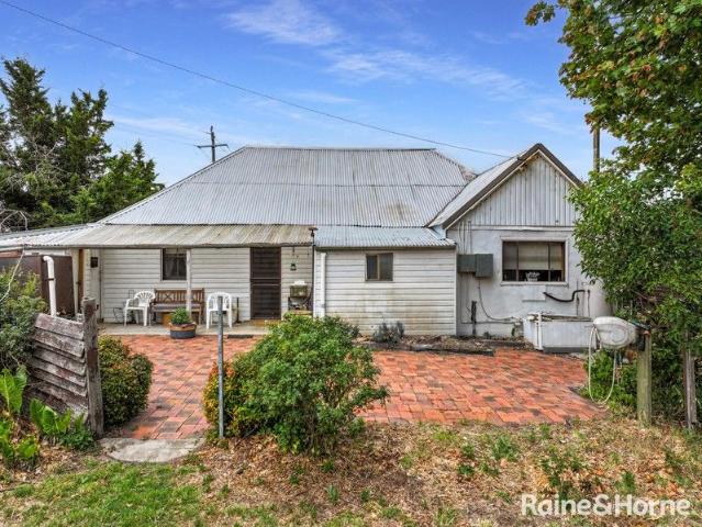 PRODUCTIVE ACREAGE WITH CHARACTER HOMESTEAD