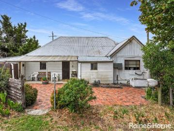 PRODUCTIVE ACREAGE WITH CHARACTER HOMESTEAD