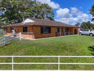 Spacious Brick Home set on Acres Close to Mid North Coast's Best Beaches!