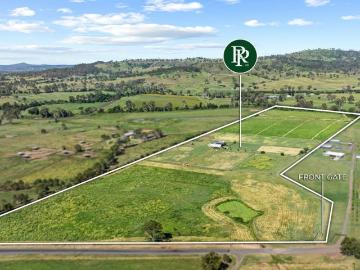 Productive Riverfront Acreage with Water and Equine Infrastructure