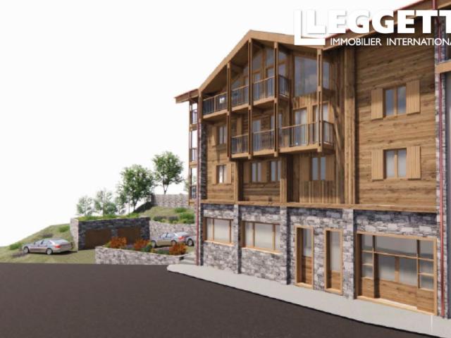 Projet de rénovation Bâtiment existant avec garages, parking et permis de construire