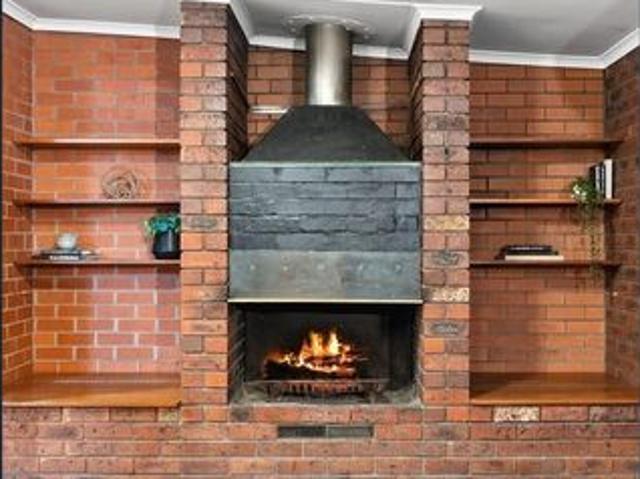 Properly Managed I Charming Mid Century Character with Spacious Living in Newcomb