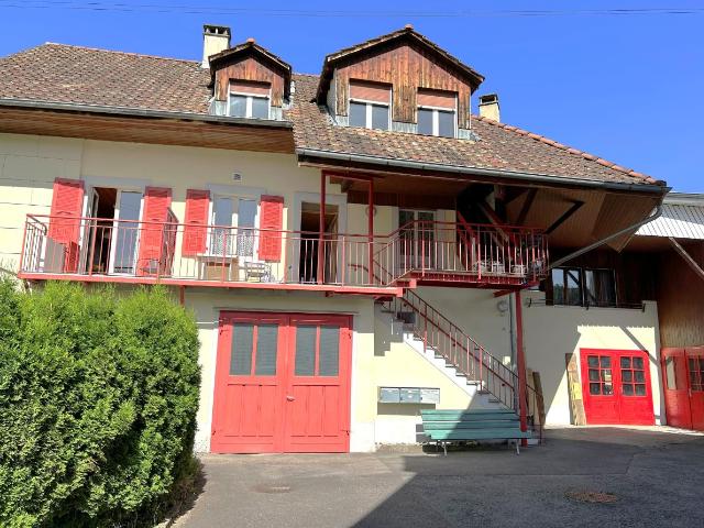 Propriété de plusieurs appartements ainsi qu'un atelier d'artisan à Porrentruy