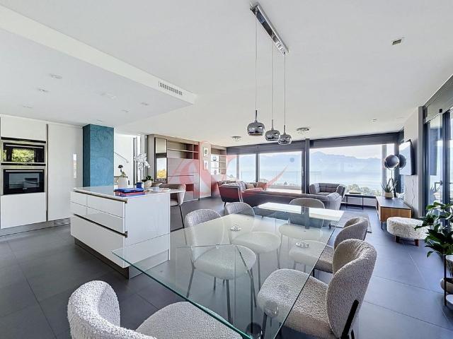 Propriété moderne offrant vue sur le lac et les Alpes ? La Conversion