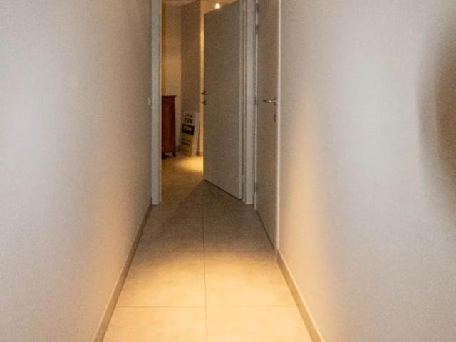 Prachtig afgewerkt nieuwbouwappartement met ruim terras en garage