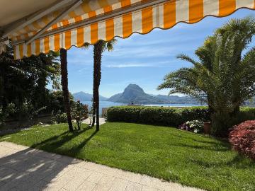 PRÄCHTIGE WOHNUNG MIT GEPFLEGTEM GARTEN UND BLICK AUF DEN SEE