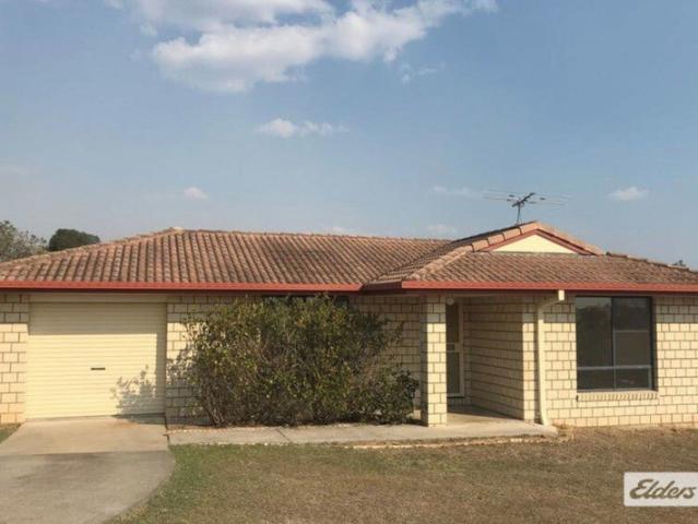 Practical 4 Bedroom Brick Home