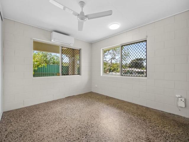 Practical Living with a Spacious Backyard!