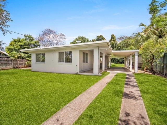 Practical Living with a Spacious Backyard!