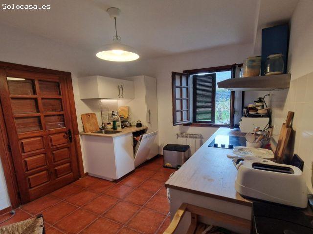 Precioso chalet con jardín en el centro histórico de Bustarviejo