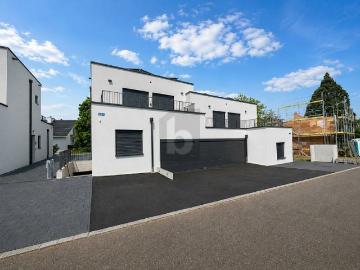 PREISHIT! NEUBAU MIT ZWEI TERRASSEN UND GARTEN