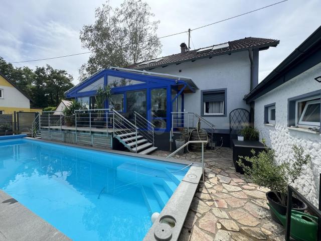 Preisreduktion! IN RUHIGER LAGE MIT GARTEN UND POOLBENÜTZUNG