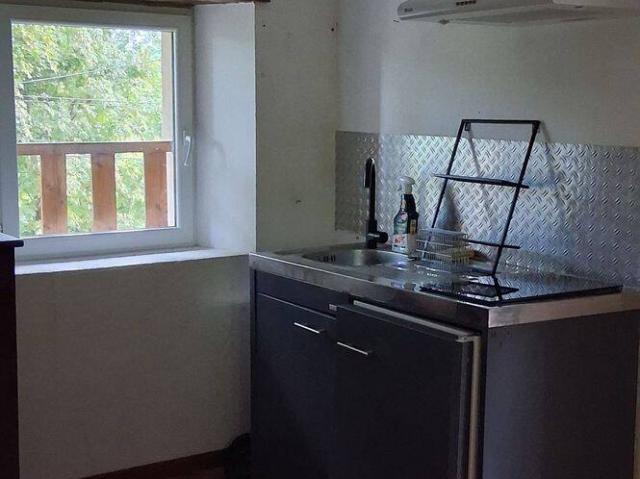 Premier étage d'une maison avec terrasse