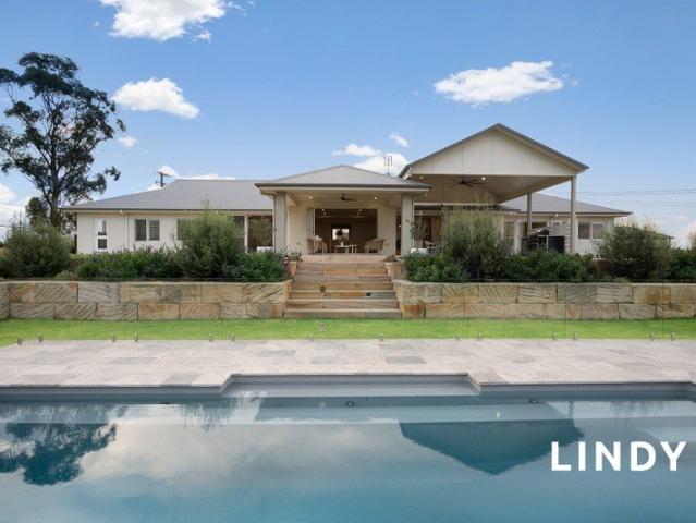 PREMIER FAMILY HOME. 1.98 ACRES