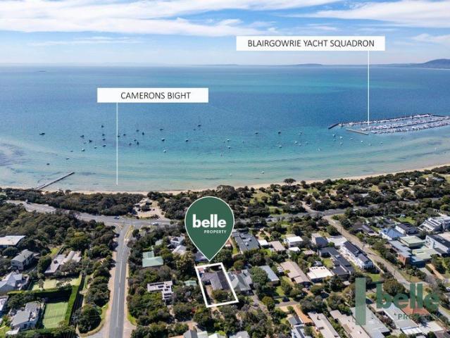 Premier position steps from the beach!