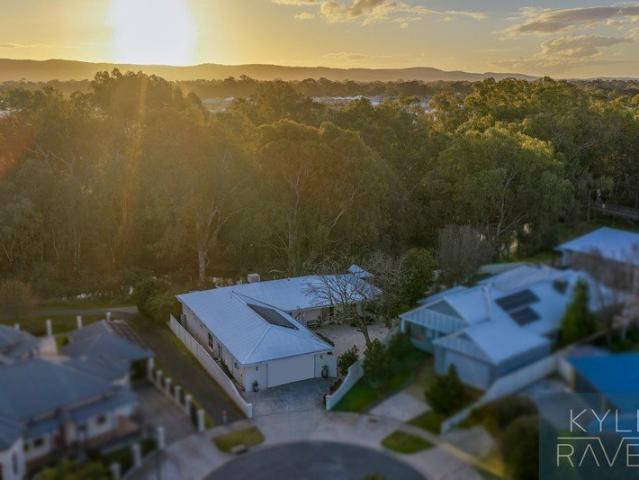 PREMIERE LOCATION WITH CREEK VIEWS