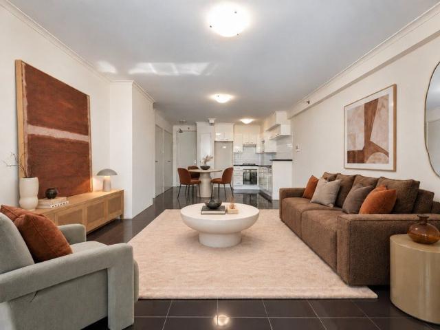 Premium CBD Living Steps from World Square