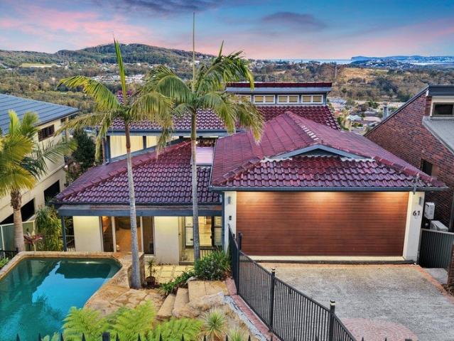Premium coastal living with panoramic ocean and district views