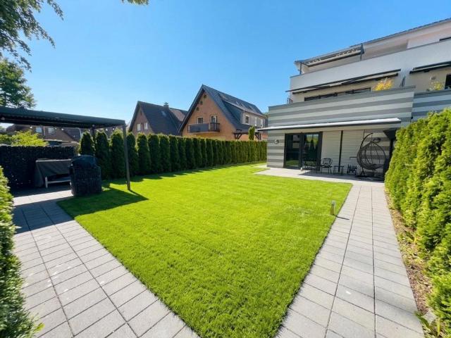 Premium Eigentumswohnung: 190qm Garten und 3,5 Zimmer mobiliert