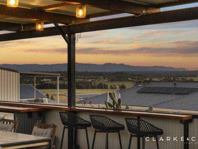 PREMIUM FAMILY LIVING WITH BREATHTAKING ELEVATED VIEWS!