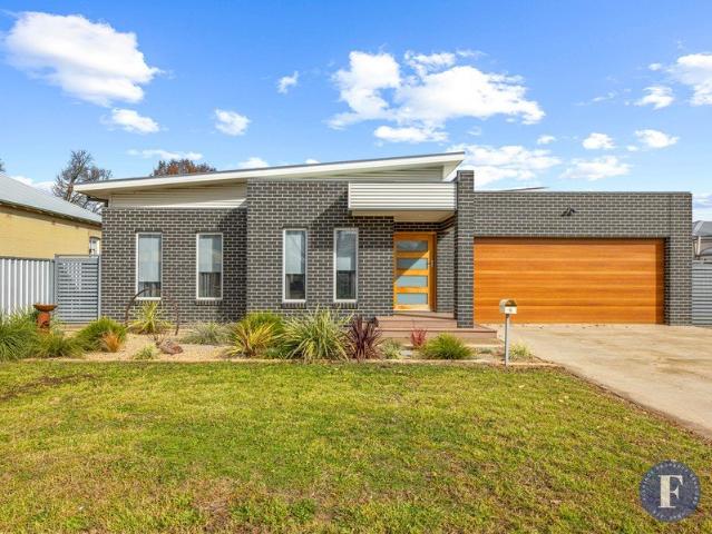 Premium Home With Self Contained Granny Flat in a Peaceful Pocket of Town