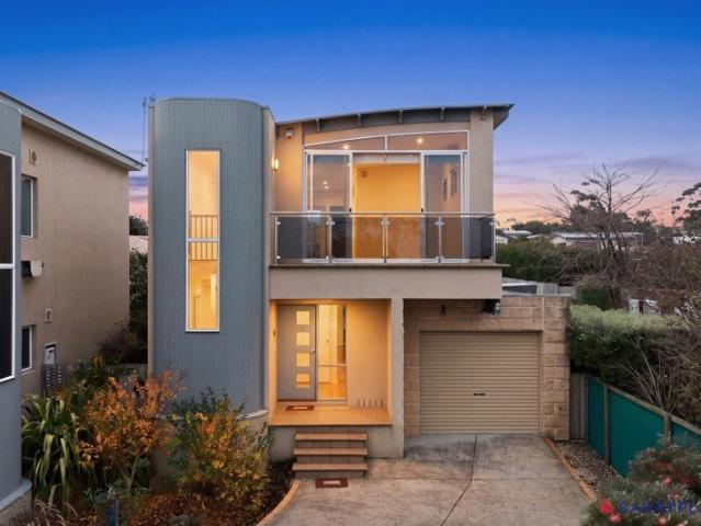 Premium Inlet Side Townhouse with Water Views and Low Maintenance Living
