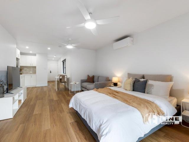 Premium Studio Living with Balcony & Pool Outlook