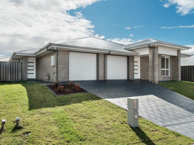 Premium Upgraded Dual Occupancy, High Yield, Long Leases in Edgeworth, NSW