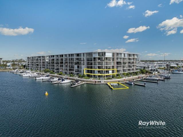 Rare Prestige North East Corner Apartment With Panoramic Water Views & Marina Berth