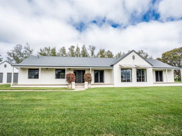 Prestige Living on Acreage A Rare Offering of Exceptional Quality