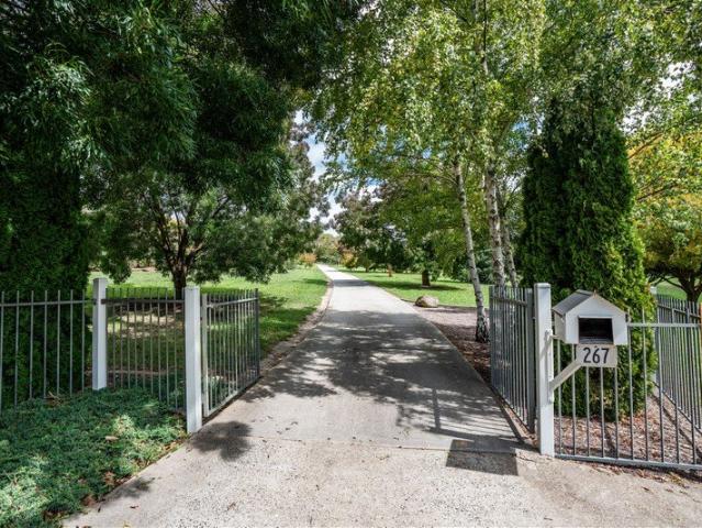 Prestige Living on Acreage A Rare Offering of Exceptional Quality