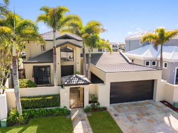 Prestigious Furnished Waterfront Estate in Exclusive Sovereign Islands