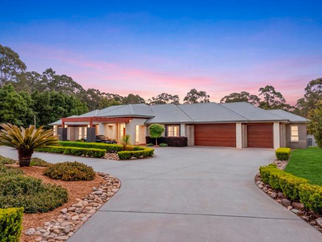 Prestigious Acreage Living with Resort Style Appeal