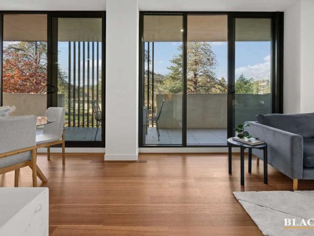 Prestigious Braddon Apartment Offering Spacious Living & Four Car Spaces