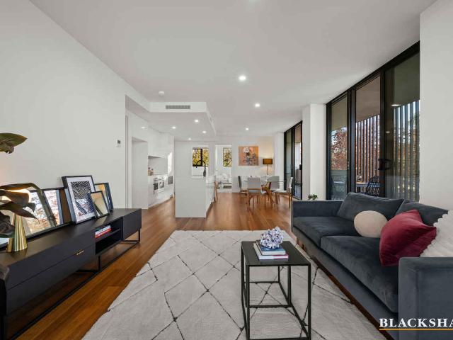 Prestigious Braddon Apartment Offering Spacious Living & Four Car Spaces