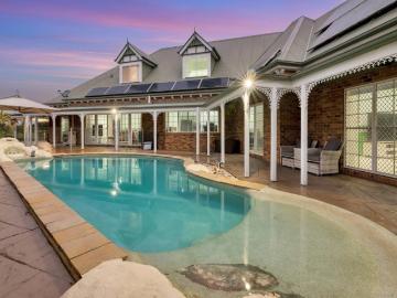 Prestigious East Facing Waterfront Living with Wide Water Views