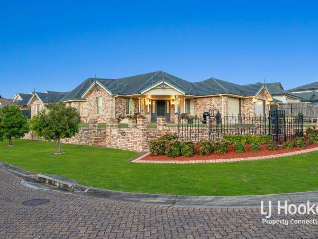 PRESTIGIOUS FAMILY LIVING IN THE EXCLUSIVE CASTLE HILL ESTATE